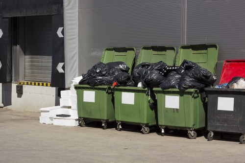 Professional team handling waste removal